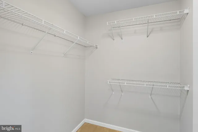 a view of a room with racks on the wall