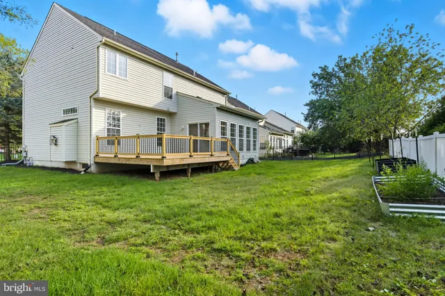 a view of a house with a roof deck