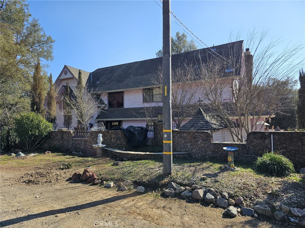 17392 Cache Creek Road Clearlake Oaks, CA 95423 - Photo 1 of 25 a view of a house with a yard