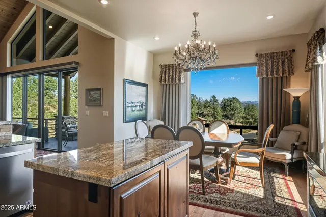 a bedroom with a large bed and a large mirror