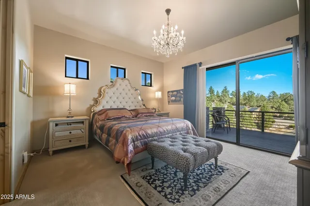a spacious bathroom with a tub sink and mirror