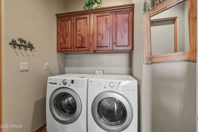 a bedroom with a bed next to a window
