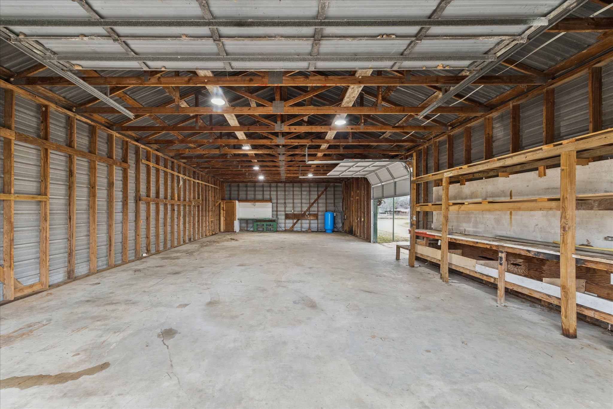 6911 Oak Lane Richmond, TX 77406 - Photo 34 of 42 a view of room with wooden ceiling