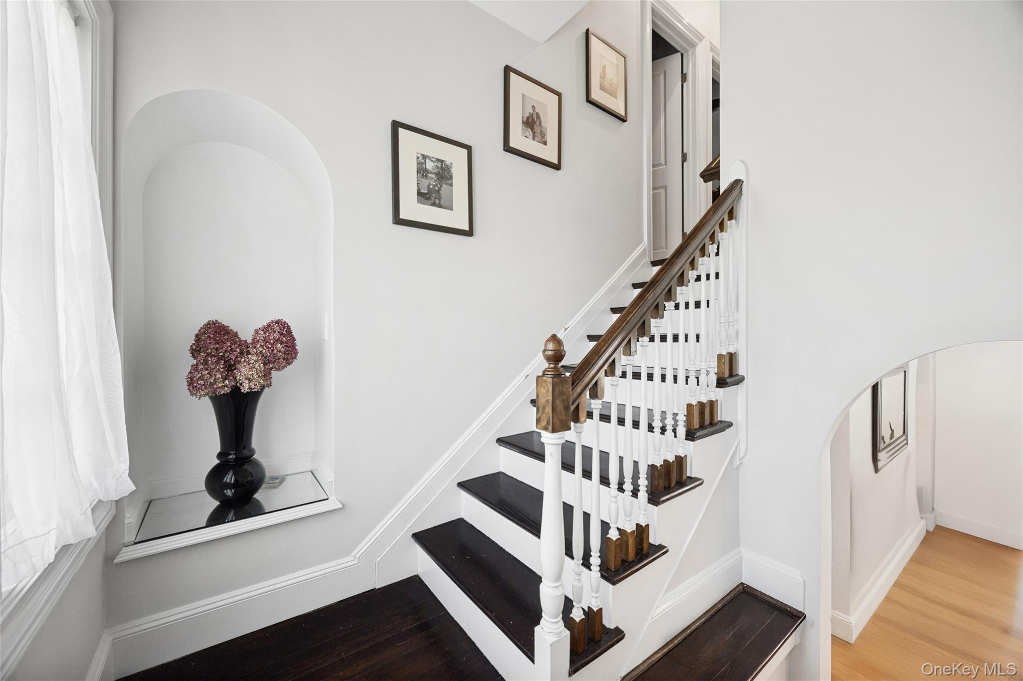 216 Beverly Road Queens, NY 11363 - Photo 8 of 50 a view of entryway with wooden floor