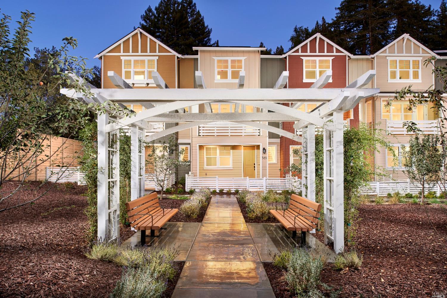 347 Skyforest Way Scotts Valley, CA 95066 - Photo 1 of 1 a view of a brick house with large windows and a yard with plants and large tree