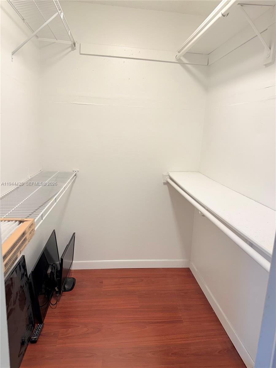 8951 North New River Canal Road, Unit 2D Plantation, FL 33324 - Photo 23 of 30 a view of an empty walk in closet