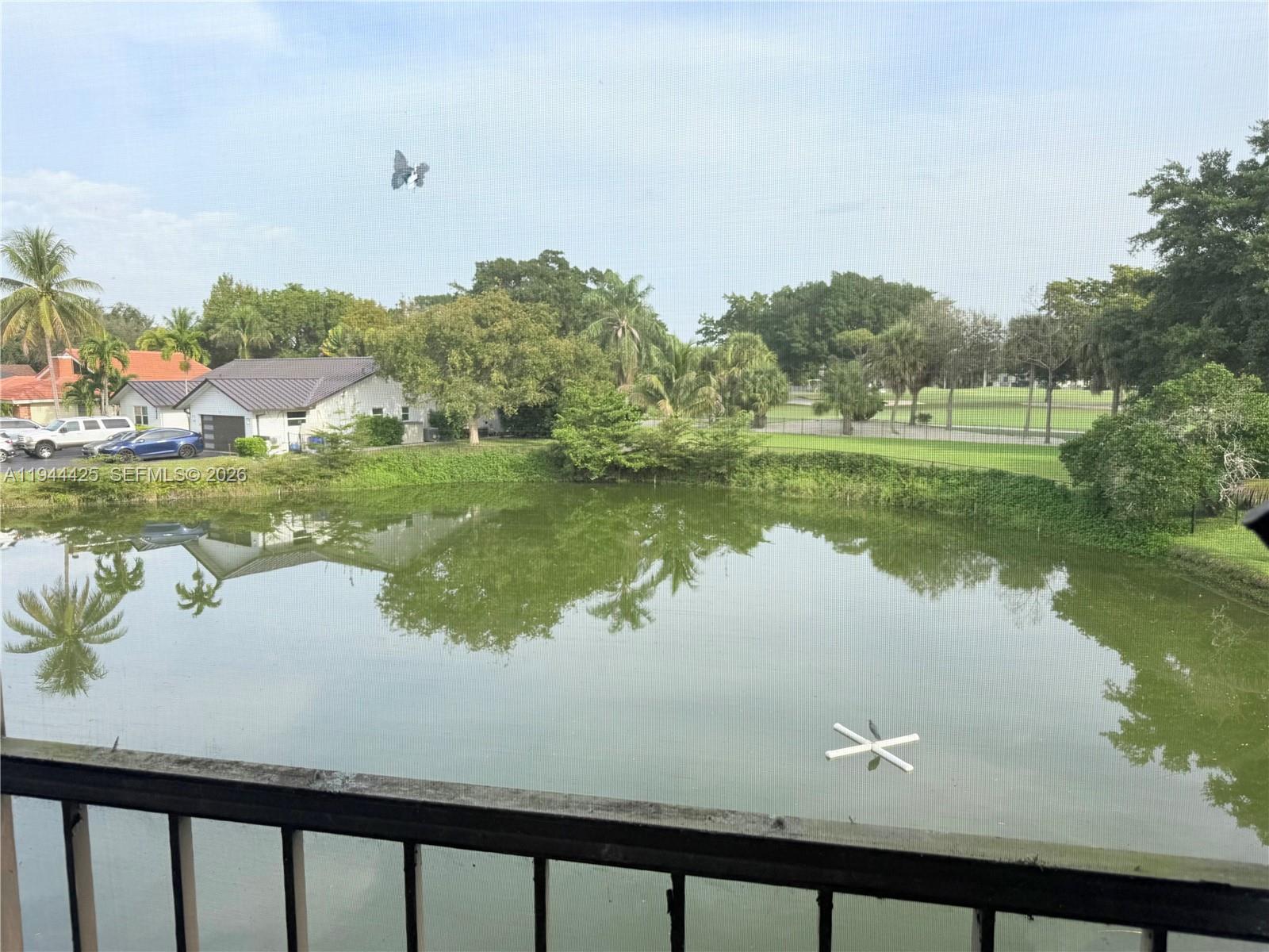 8951 North New River Canal Road, Unit 2D Plantation, FL 33324 - Photo 26 of 30 a view of lake from a balcony