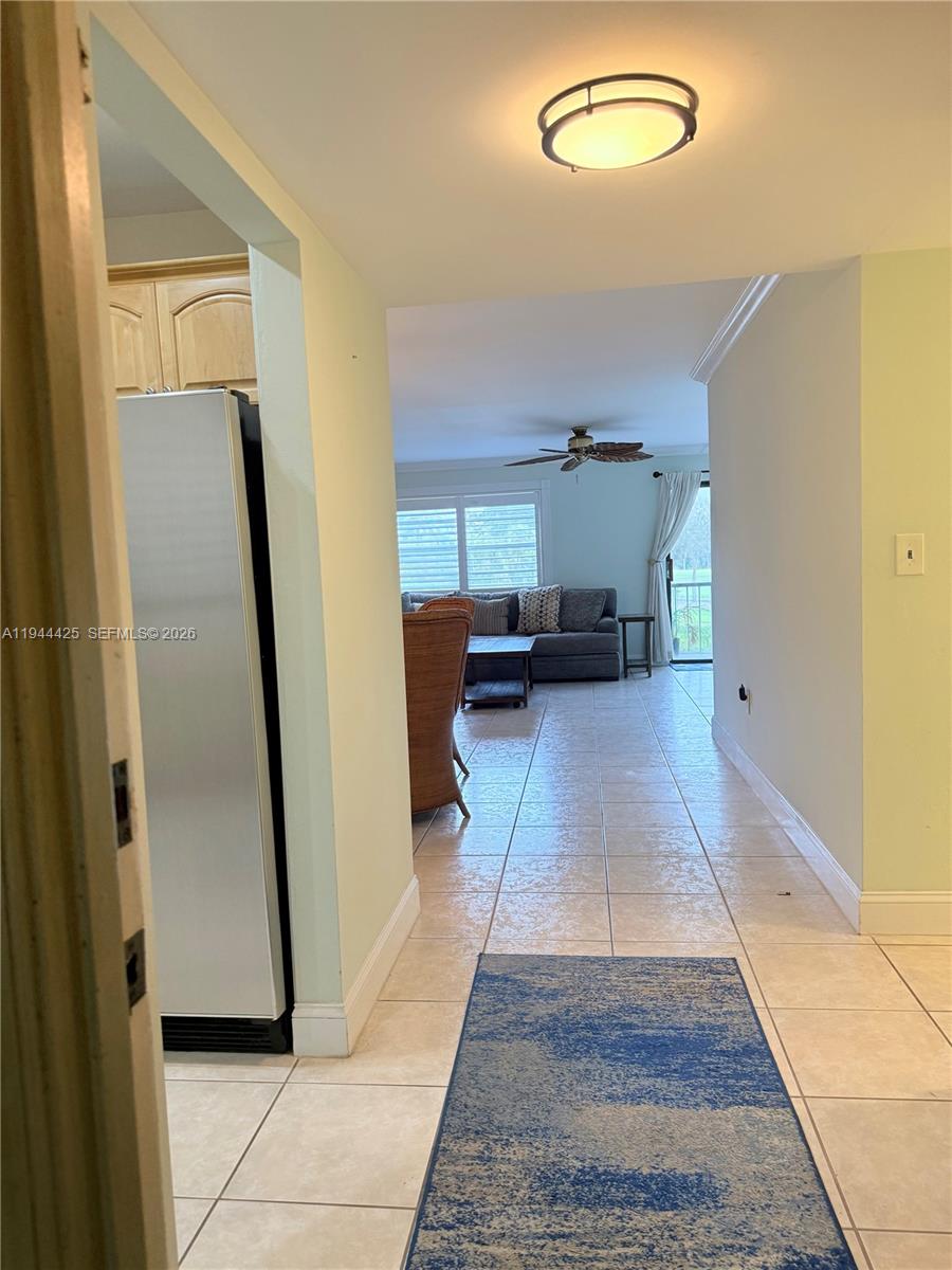 8951 North New River Canal Road, Unit 2D Plantation, FL 33324 - Photo 5 of 30 a view of a hallway with seating area