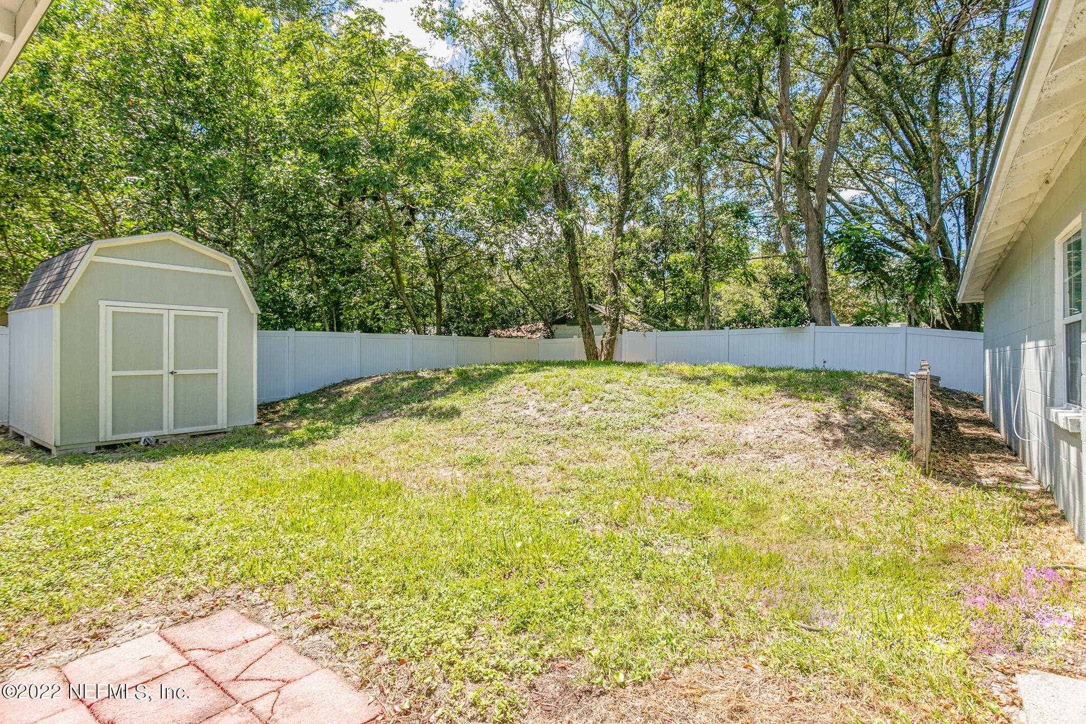 4631 Tanbark Road Jacksonville, FL 32210 - Photo 24 of 27 a view of a backyard