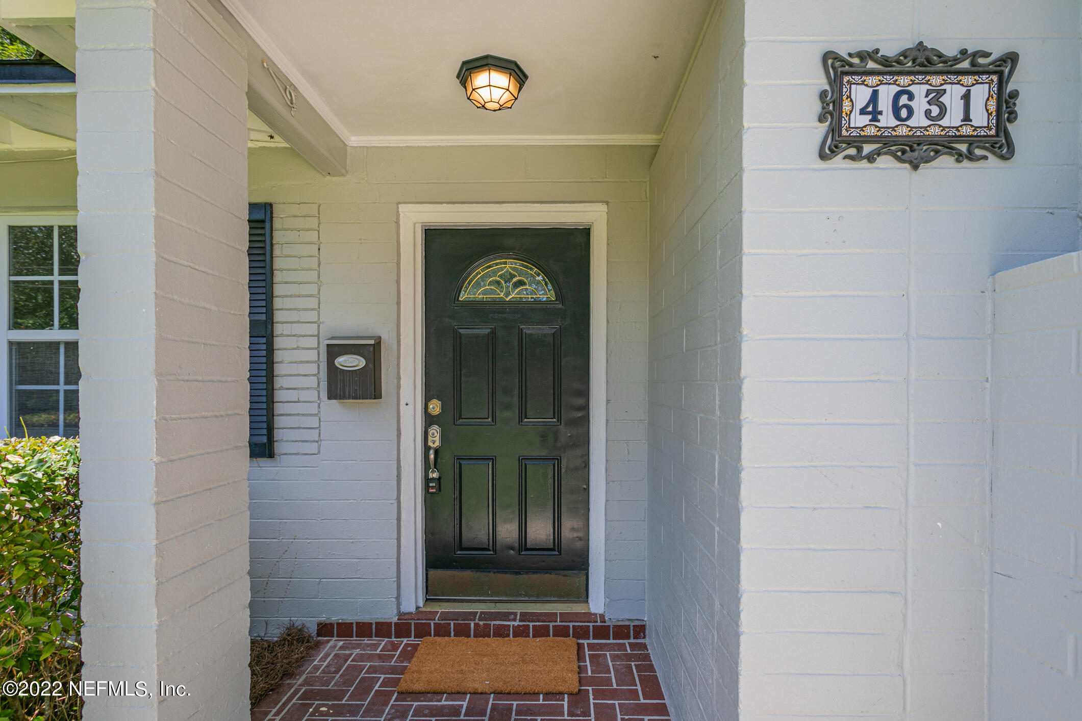 4631 Tanbark Road Jacksonville, FL 32210 - Photo 27 of 27 a view of a hallway with wooden floor