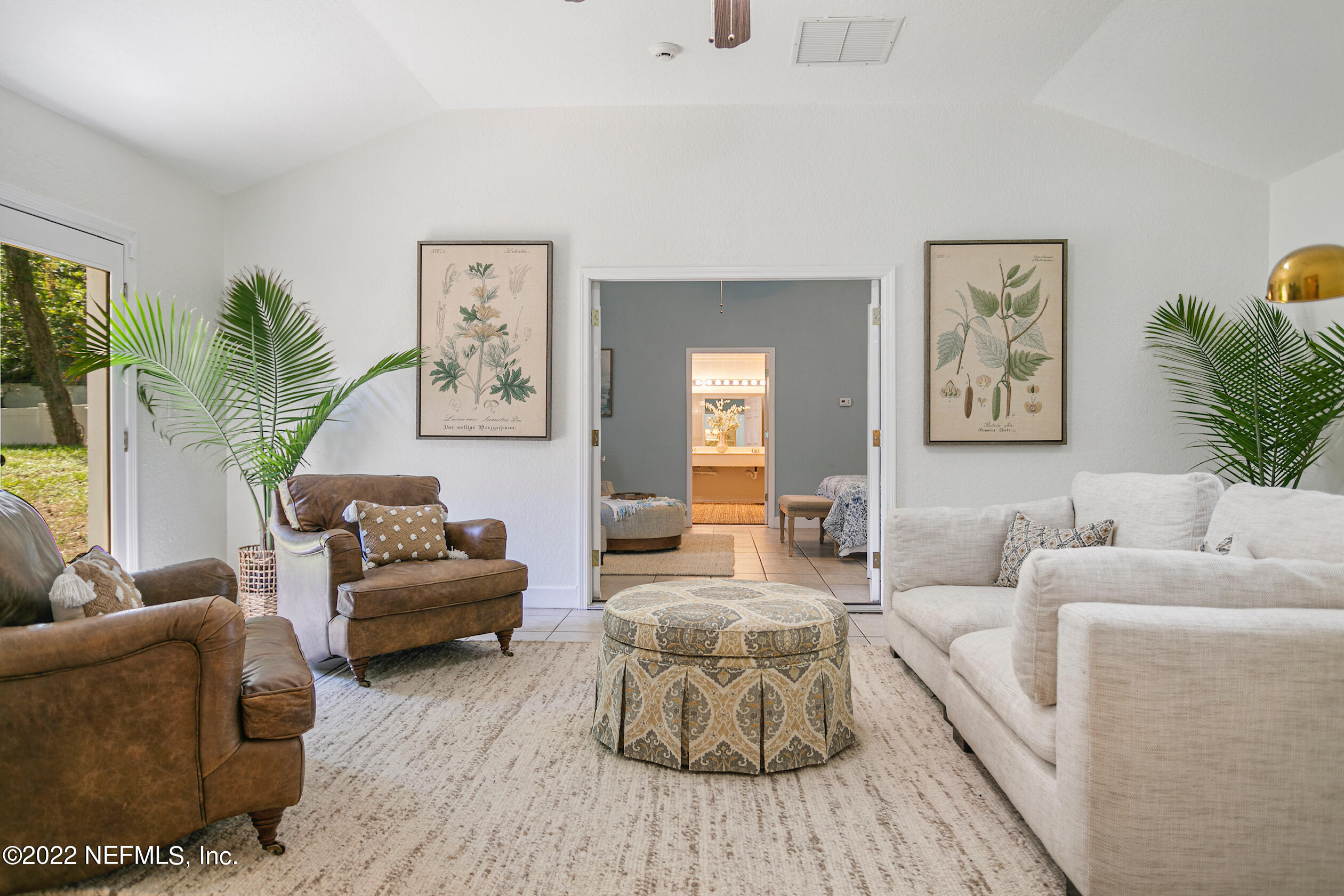 4631 Tanbark Road Jacksonville, FL 32210 - Photo 4 of 27 a living room with furniture and a couch