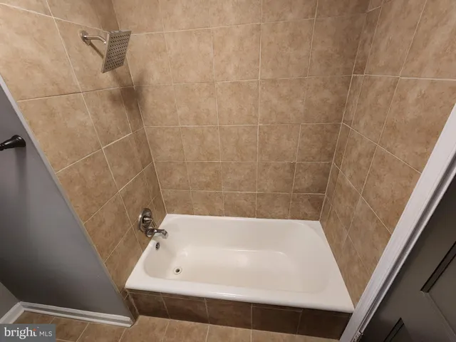 a bathroom with a bathtub