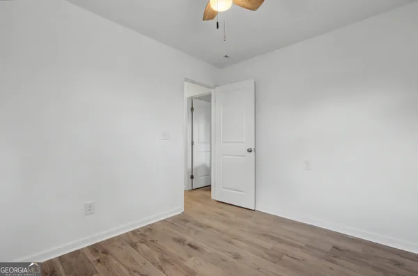 a bathroom with a bathtub and sink