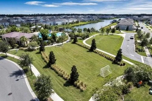 an aerial view of residential house with outdoor space