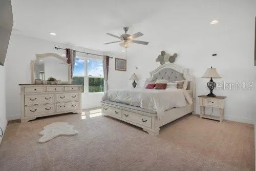 a bed room with a bed and a night stand