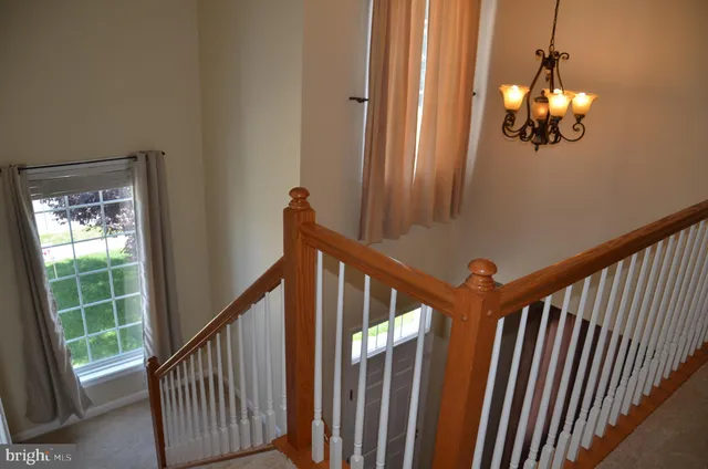 a view of a porch with wooden floor