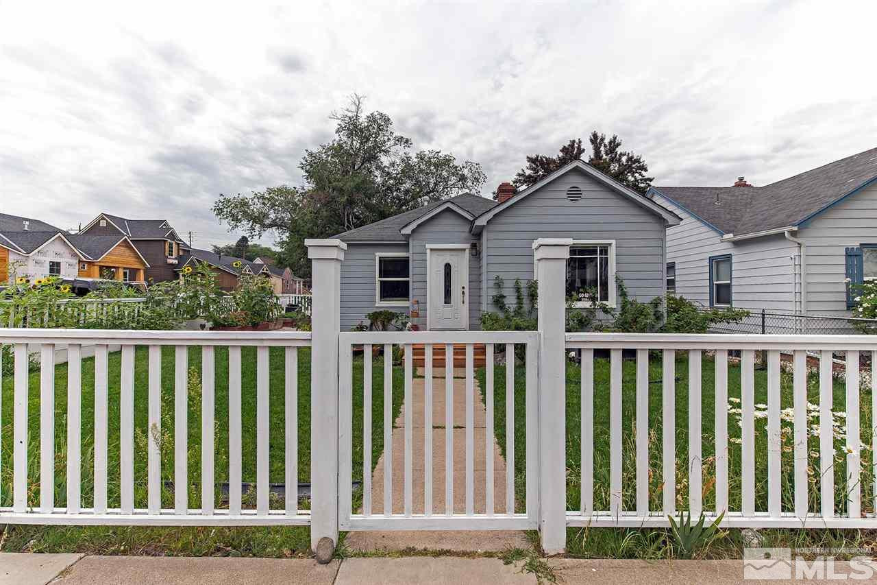 1461 Forest Street Reno, NV 89509 - Photo 1 of 1 a view of a brick house with a small yard and plants