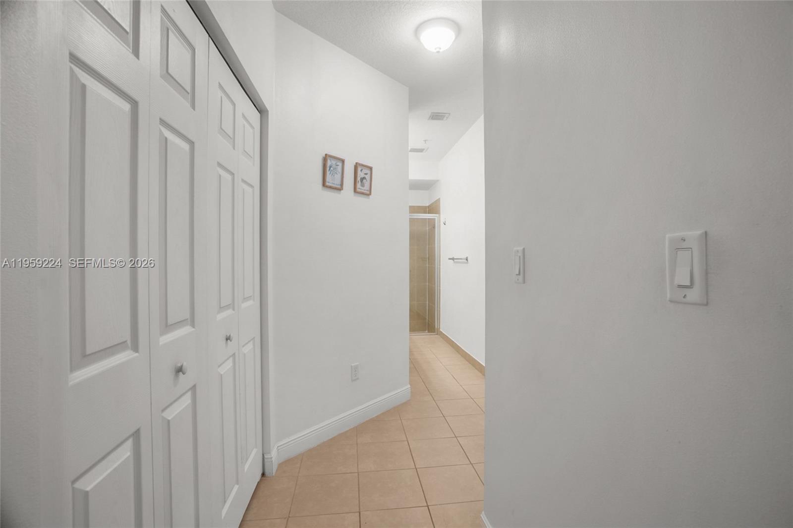 14774 Southwest 10th Street, Unit 10502 Pembroke Pines, FL 33027 - Photo 19 of 42 a view of a hallway