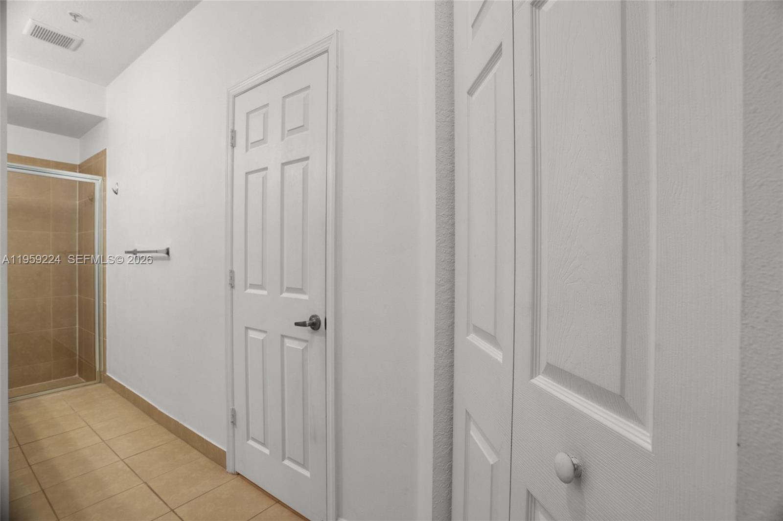 14774 Southwest 10th Street, Unit 10502 Pembroke Pines, FL 33027 - Photo 20 of 42 a view of a hallway