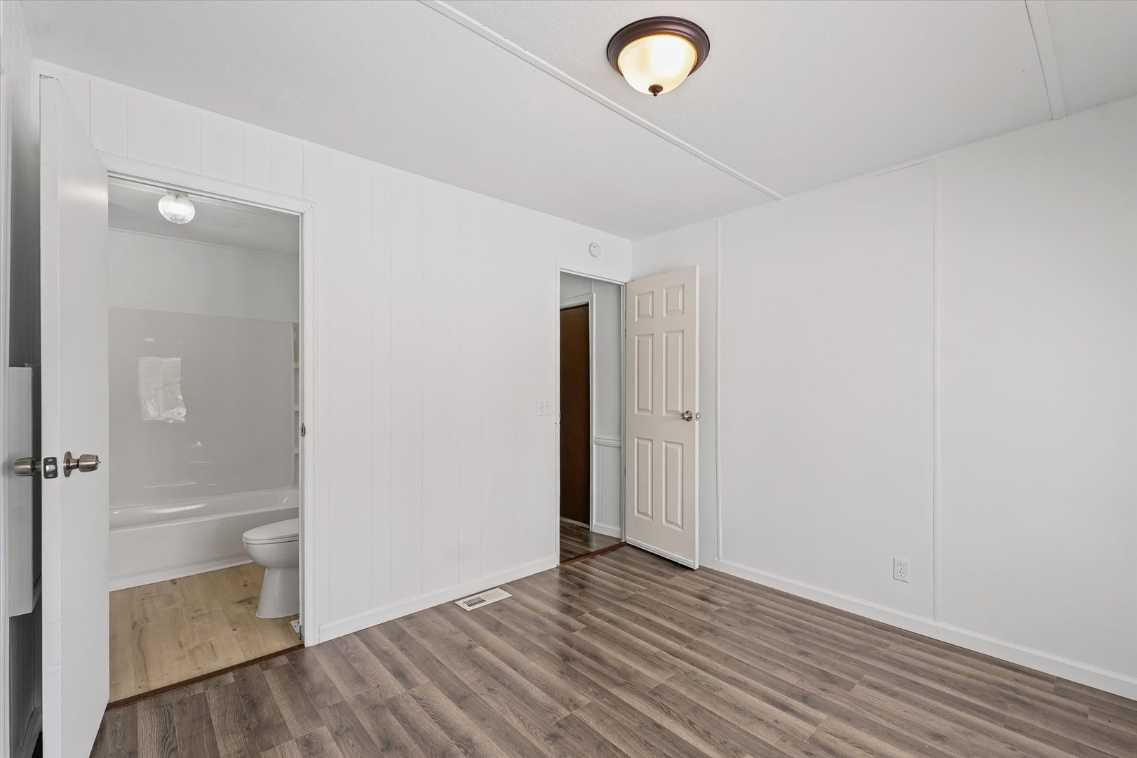 1221 Brookshire Drive, Unit 1221 Rantoul, IL 61866 - Photo 21 of 30 a view of a livingroom with wooden floor