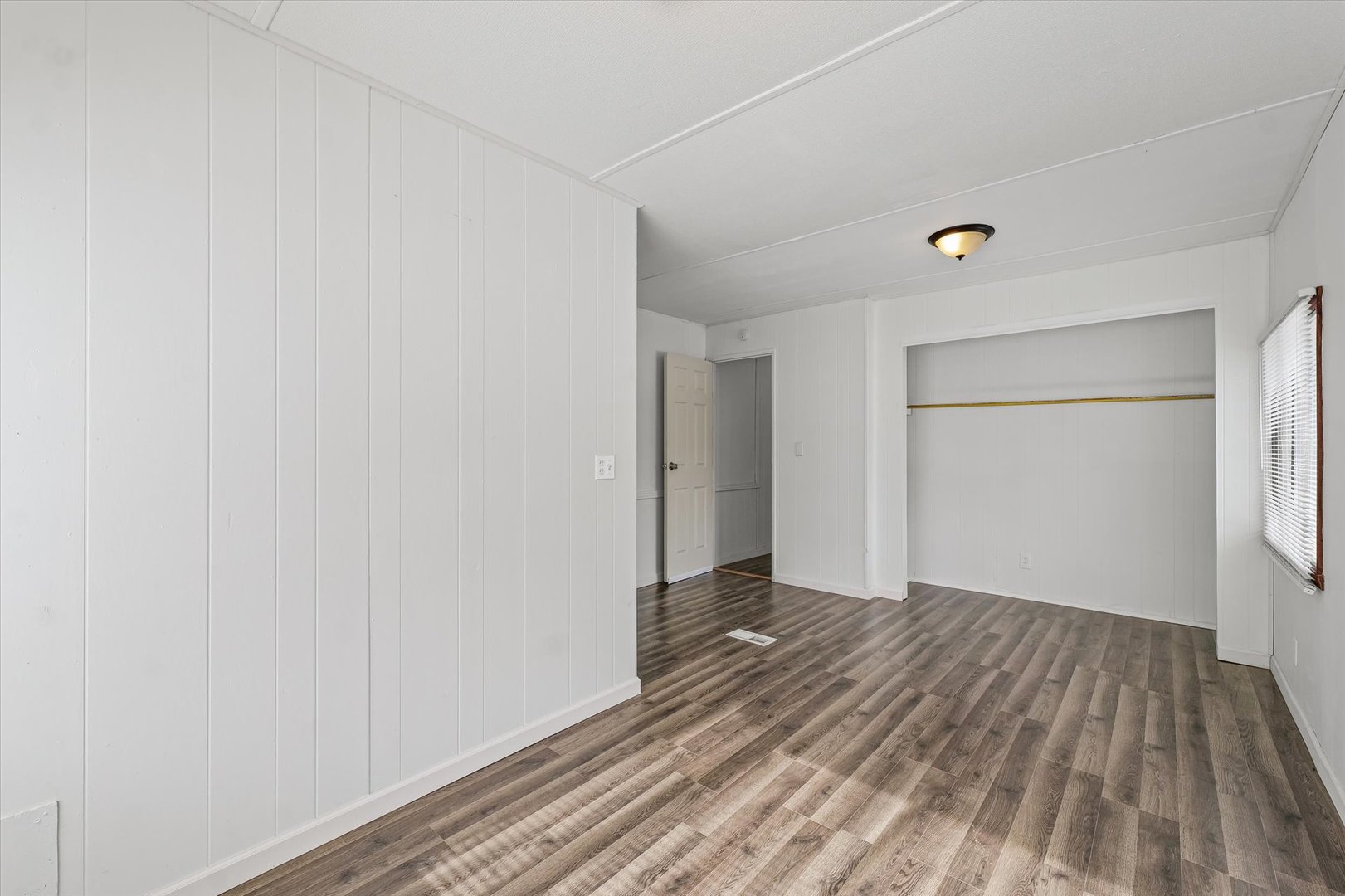 1221 Brookshire Drive, Unit 1221 Rantoul, IL 61866 - Photo 24 of 30 a view of a room with wooden floor