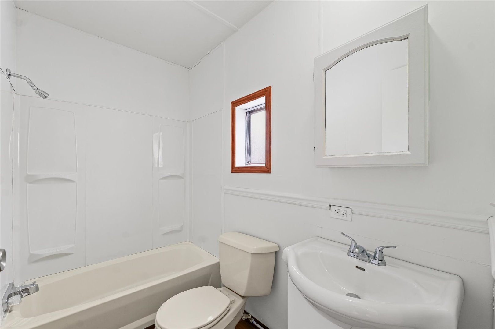 1221 Brookshire Drive, Unit 1221 Rantoul, IL 61866 - Photo 25 of 30 a bathroom with a sink toilet and bathtub