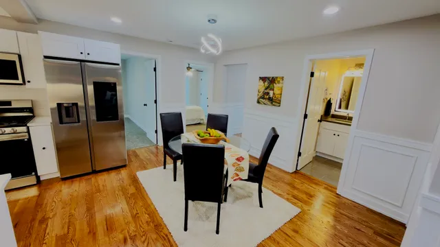 a workspace with furniture and wooden floor