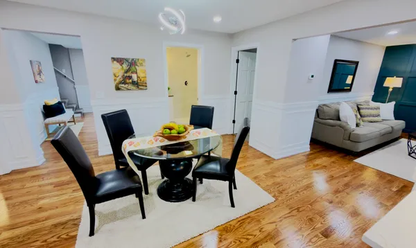 a view of a dining room with furniture and a couch
