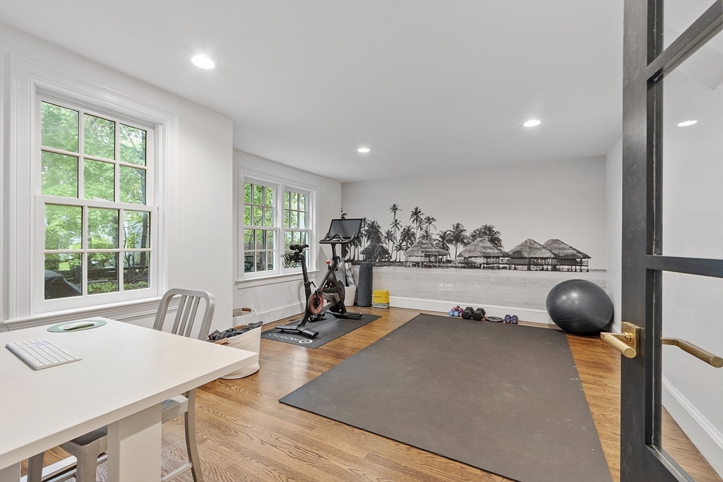 90 Coolidge Road Concord, MA 01742 - Photo 32 of 42 a view of a room with gym equipment