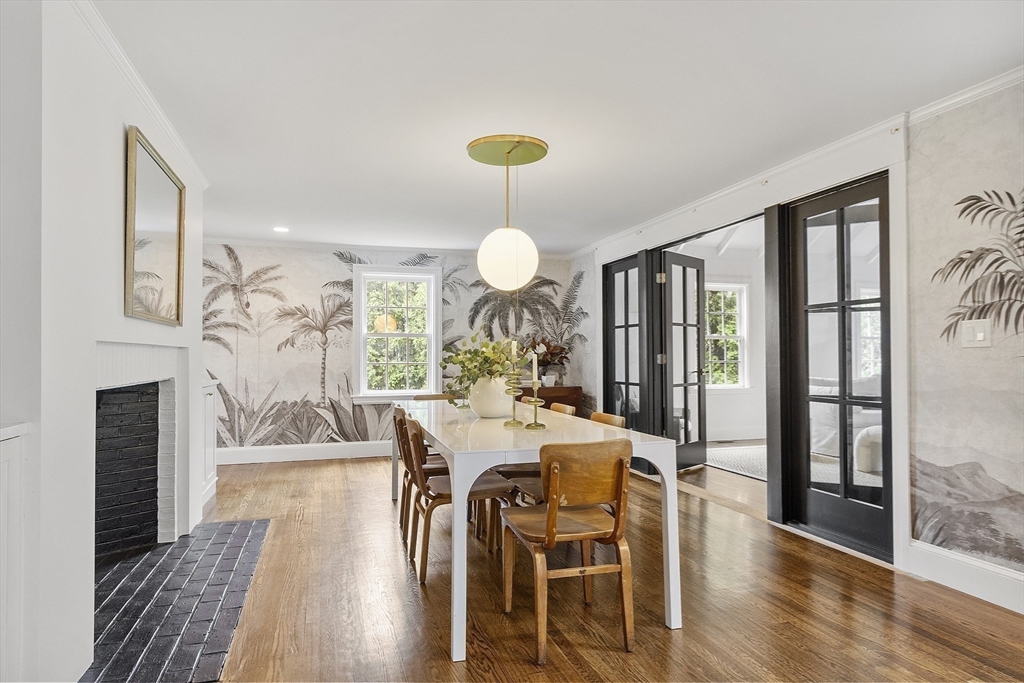 90 Coolidge Road Concord, MA 01742 - Photo 4 of 42 a view of a dining room with furniture and wooden floor