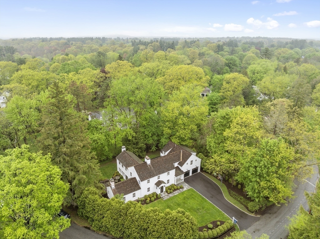 90 Coolidge Road Concord, MA 01742 - Photo 42 of 42 an aerial view of a house with a yard