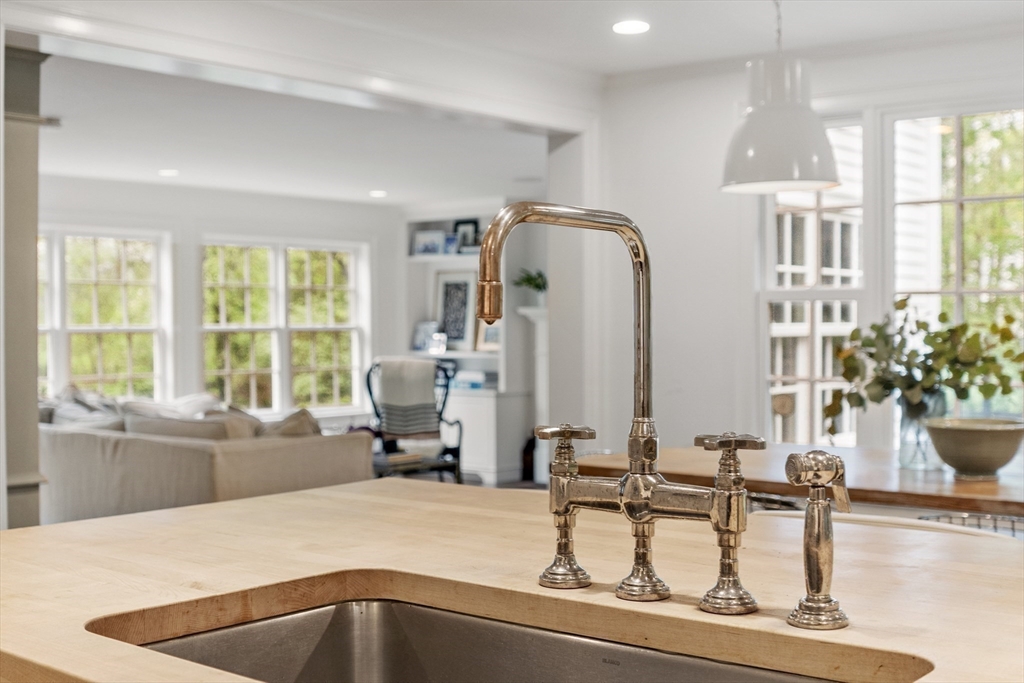 90 Coolidge Road Concord, MA 01742 - Photo 9 of 42 a room with a large window and furniture