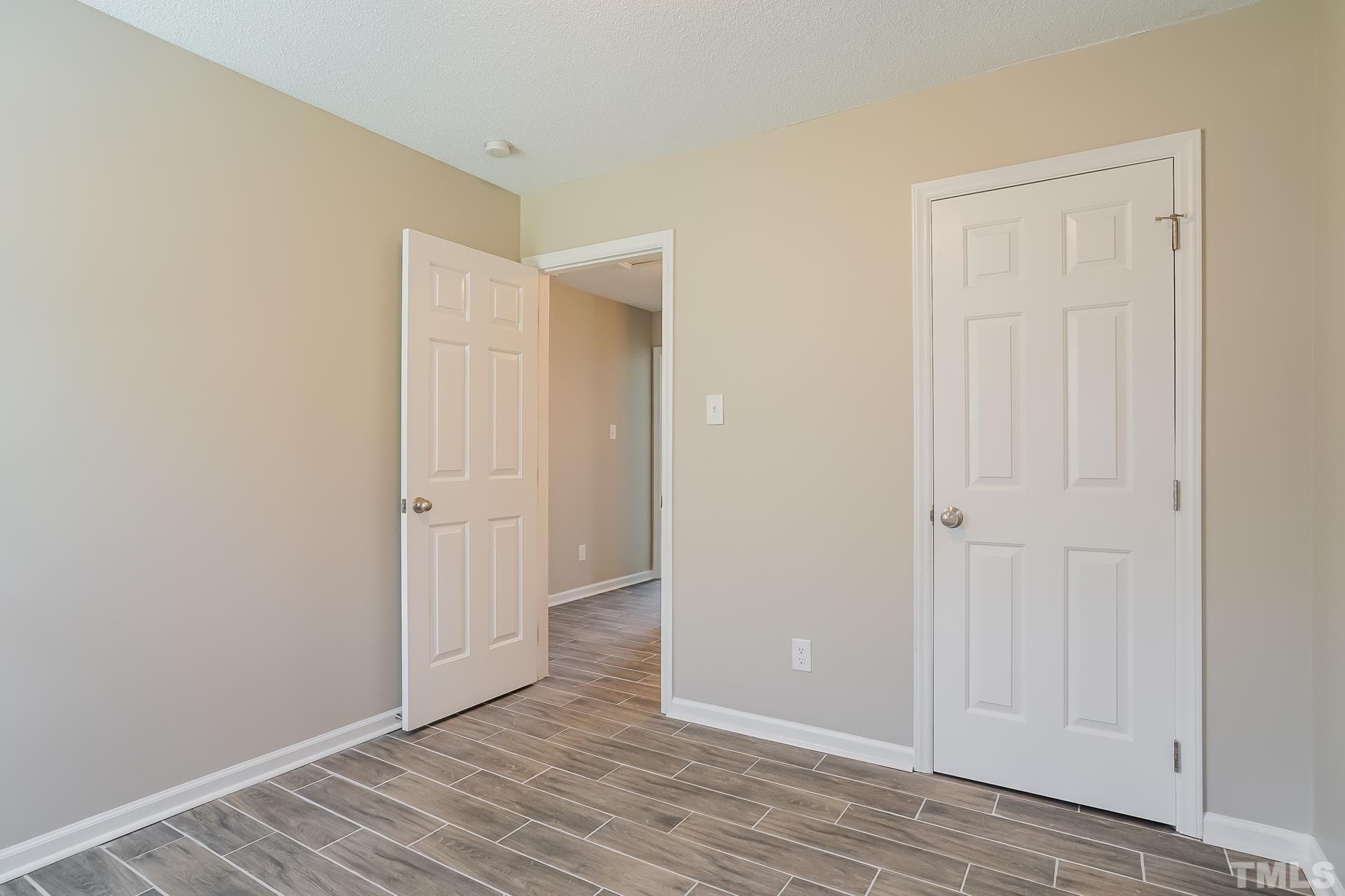 110 Impressive Lane Clayton, NC 27520 - Photo 13 of 16 a view of an empty room