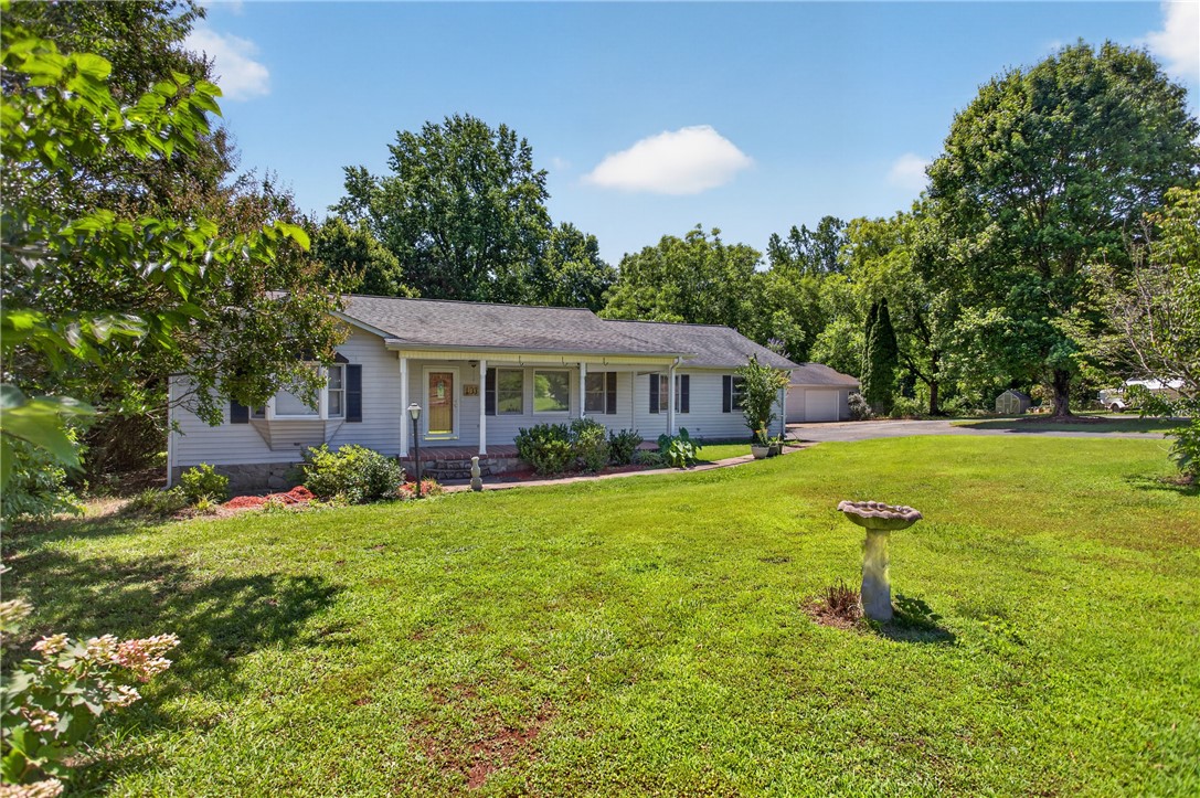 103 Dorsey Lane Walhalla, SC 29691 - Photo 1 of 42 A welcoming front porch invites you into this single-level residence, framed by mature trees and a verdant lawn.