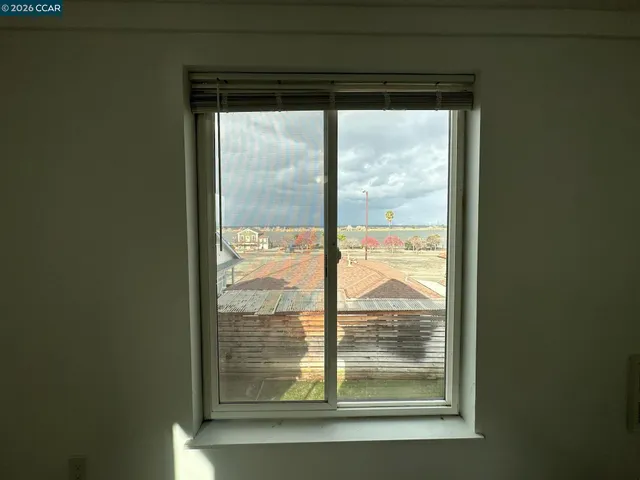 a view of hallway with stairs