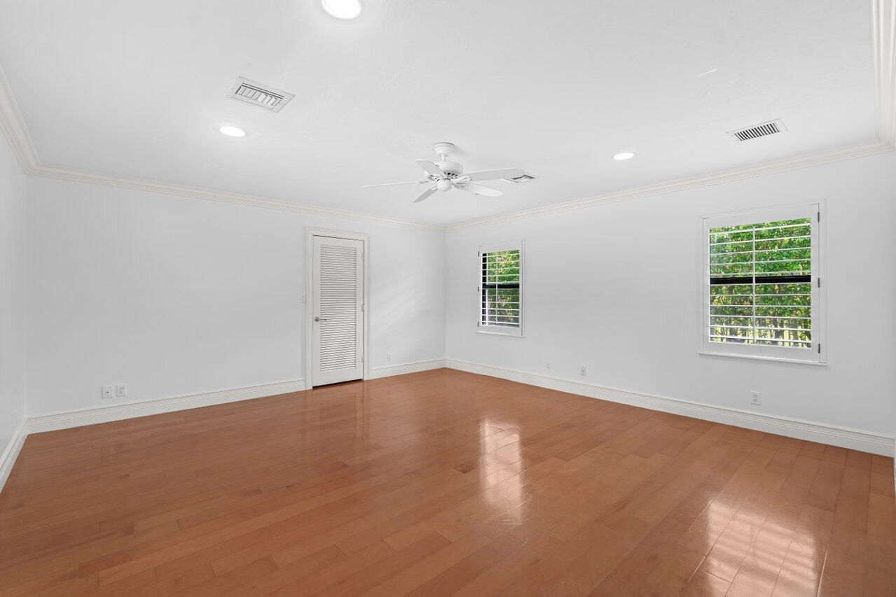 3523 Pine Haven Circle Boca Raton, FL 33431 - Photo 17 of 42 an empty room with a window and a ceiling fan