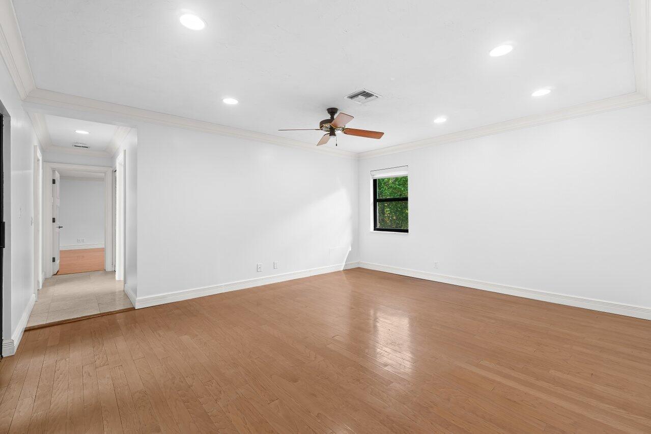 3523 Pine Haven Circle Boca Raton, FL 33431 - Photo 19 of 42 an empty room with a window and a ceiling fan