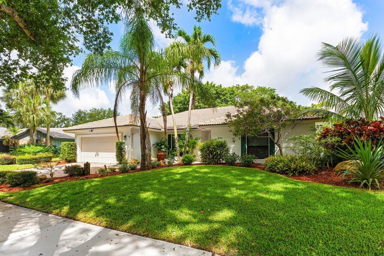 3523 Pine Haven Circle Boca Raton, FL 33431 - Photo 2 of 42 a front view of house with yard and green space