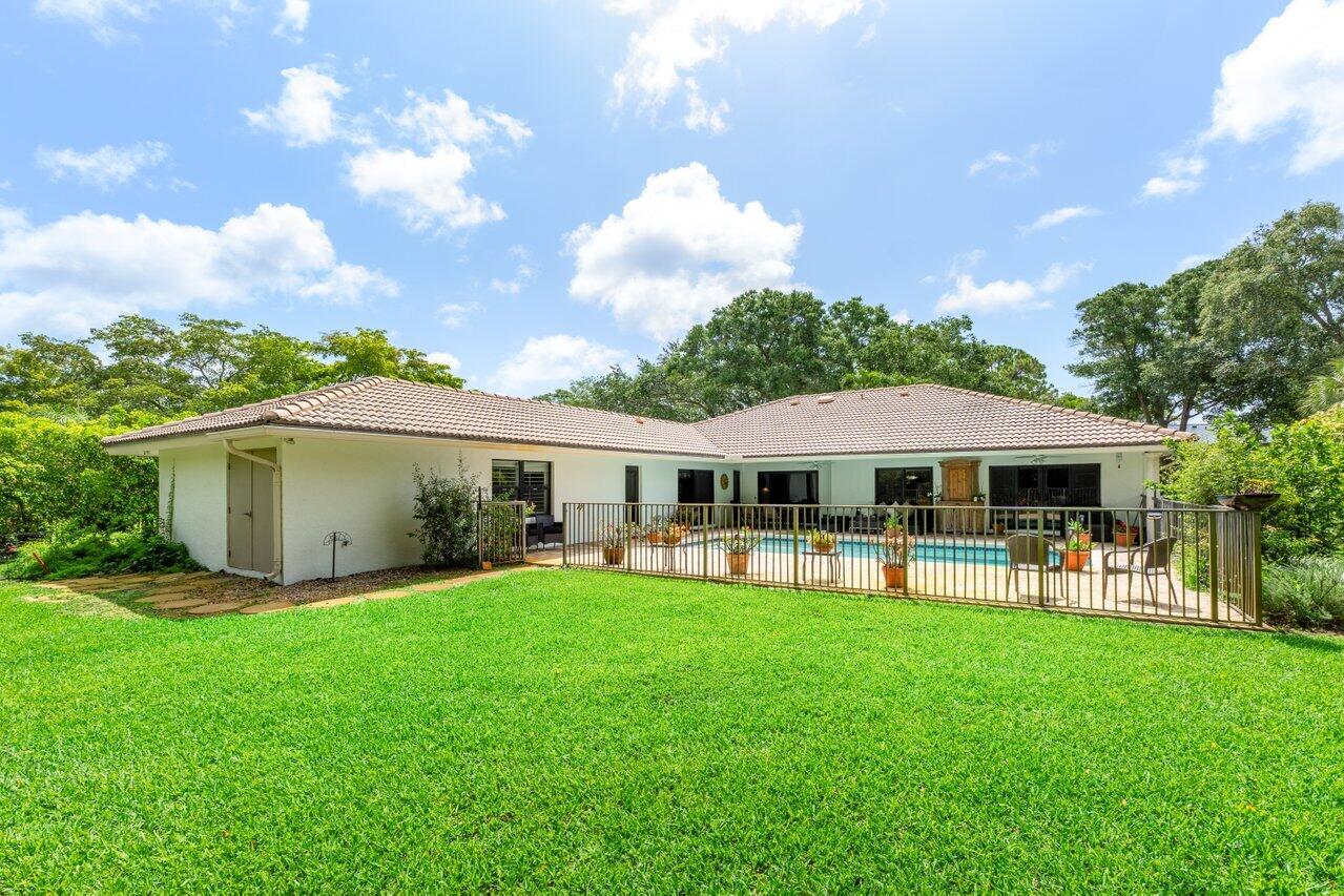 3523 Pine Haven Circle Boca Raton, FL 33431 - Photo 30 of 42 a view of a house with a yard porch and sitting area