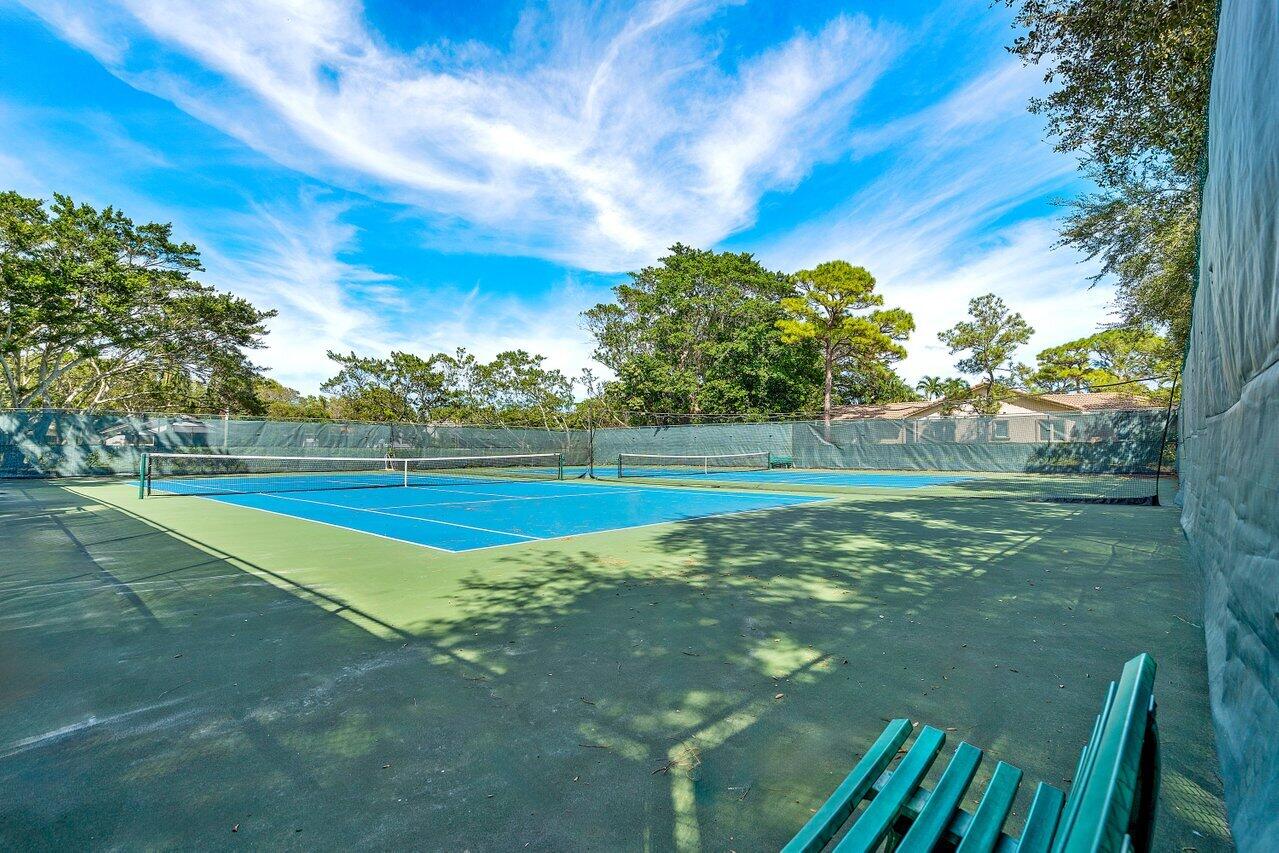 3523 Pine Haven Circle Boca Raton, FL 33431 - Photo 40 of 42 a view of a tennis ground with large trees