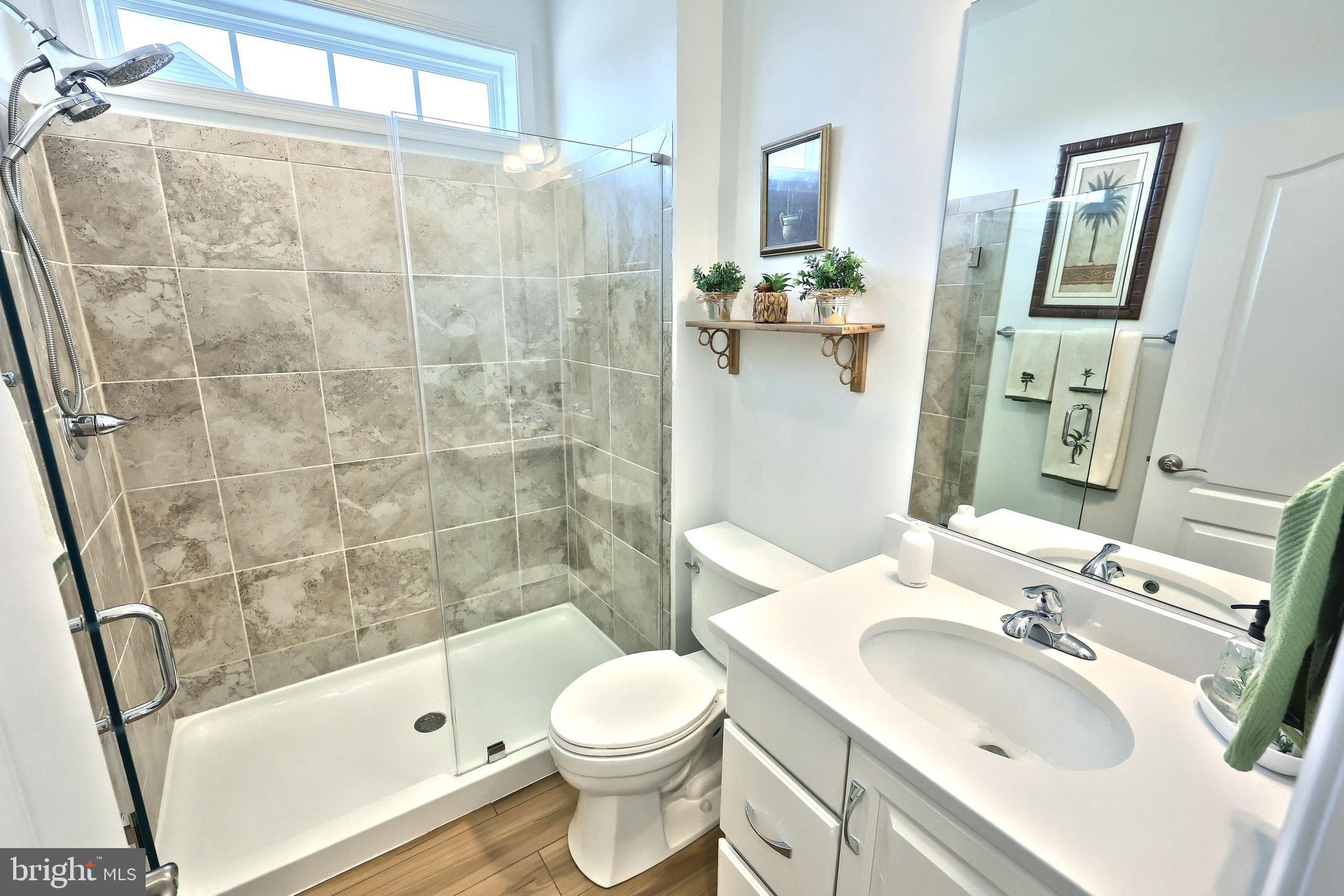 130 Pheasant Ridge Road Hanover, PA 17331 - Photo 20 of 59 a bathroom with a sink a toilet and shower