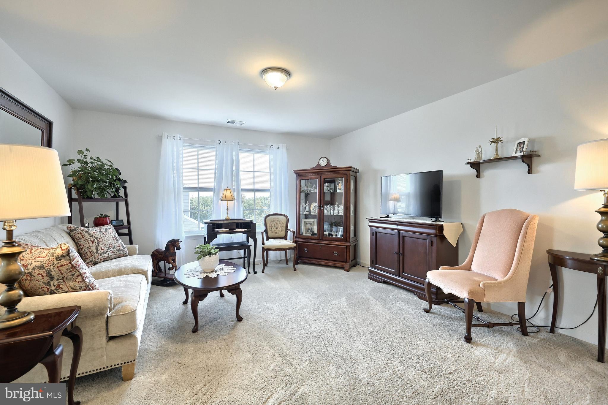 130 Pheasant Ridge Road Hanover, PA 17331 - Photo 22 of 59 a living room with furniture and a flat screen tv