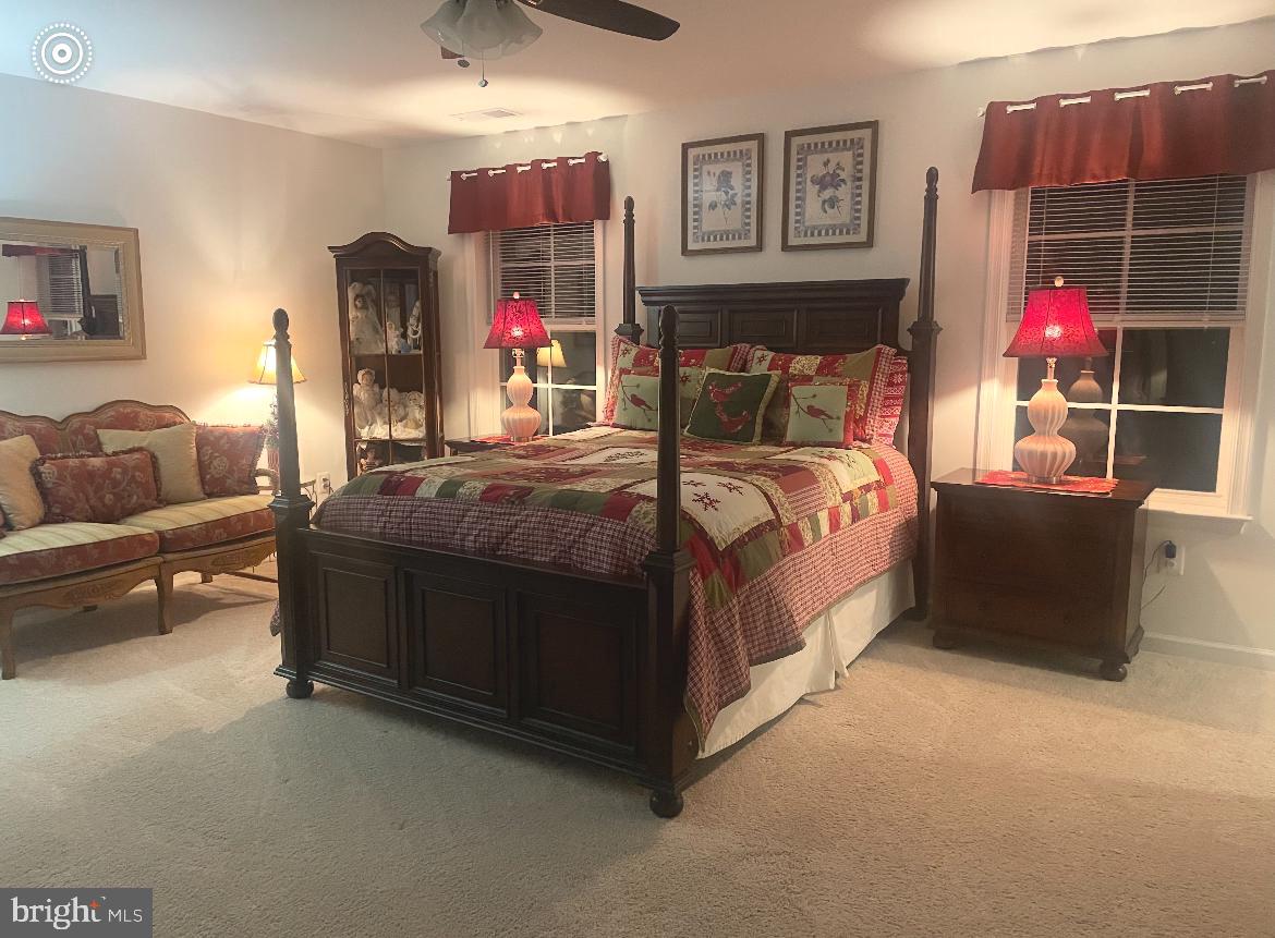 130 Pheasant Ridge Road Hanover, PA 17331 - Photo 23 of 59 a bed room with a bed and a couch