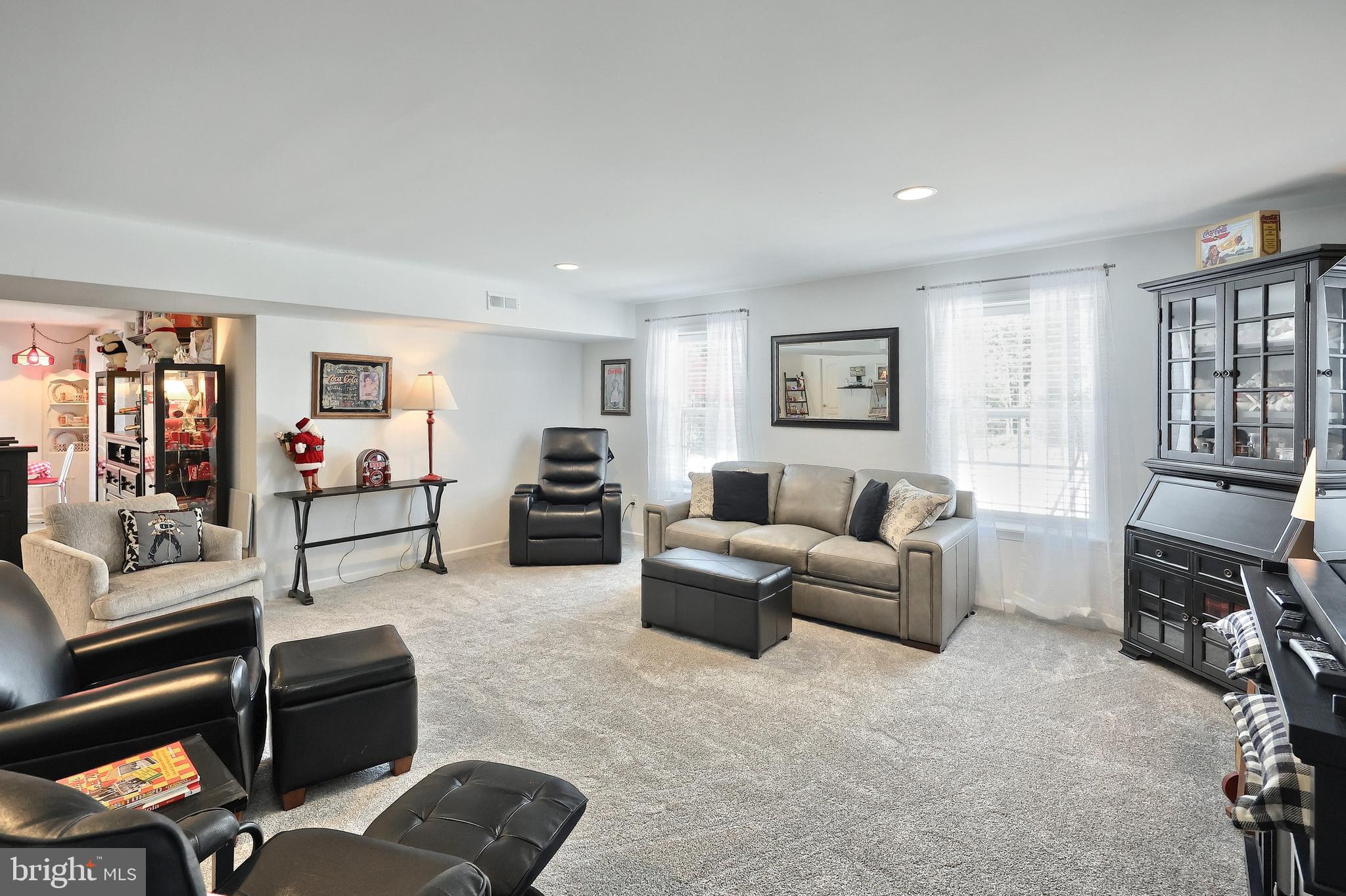 130 Pheasant Ridge Road Hanover, PA 17331 - Photo 31 of 59 a living room with furniture and a flat screen tv