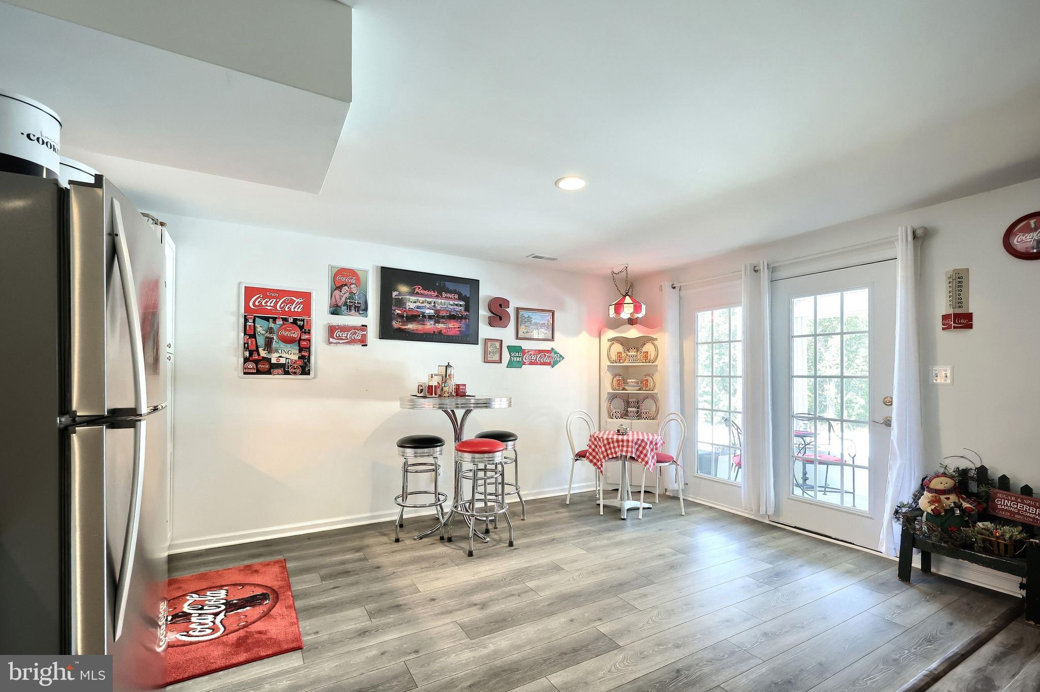 130 Pheasant Ridge Road Hanover, PA 17331 - Photo 32 of 59 a view of livingroom with hardwood floor and a flat screen tv