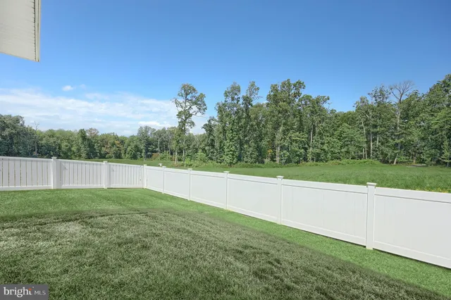 a backyard of a house with seating space