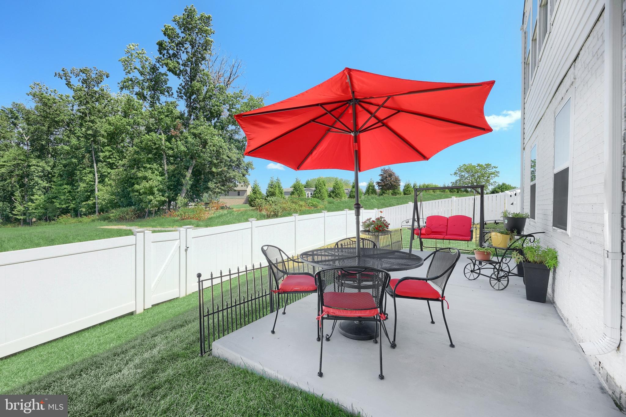 130 Pheasant Ridge Road Hanover, PA 17331 - Photo 40 of 59 a view of a table and chairs under an umbrella