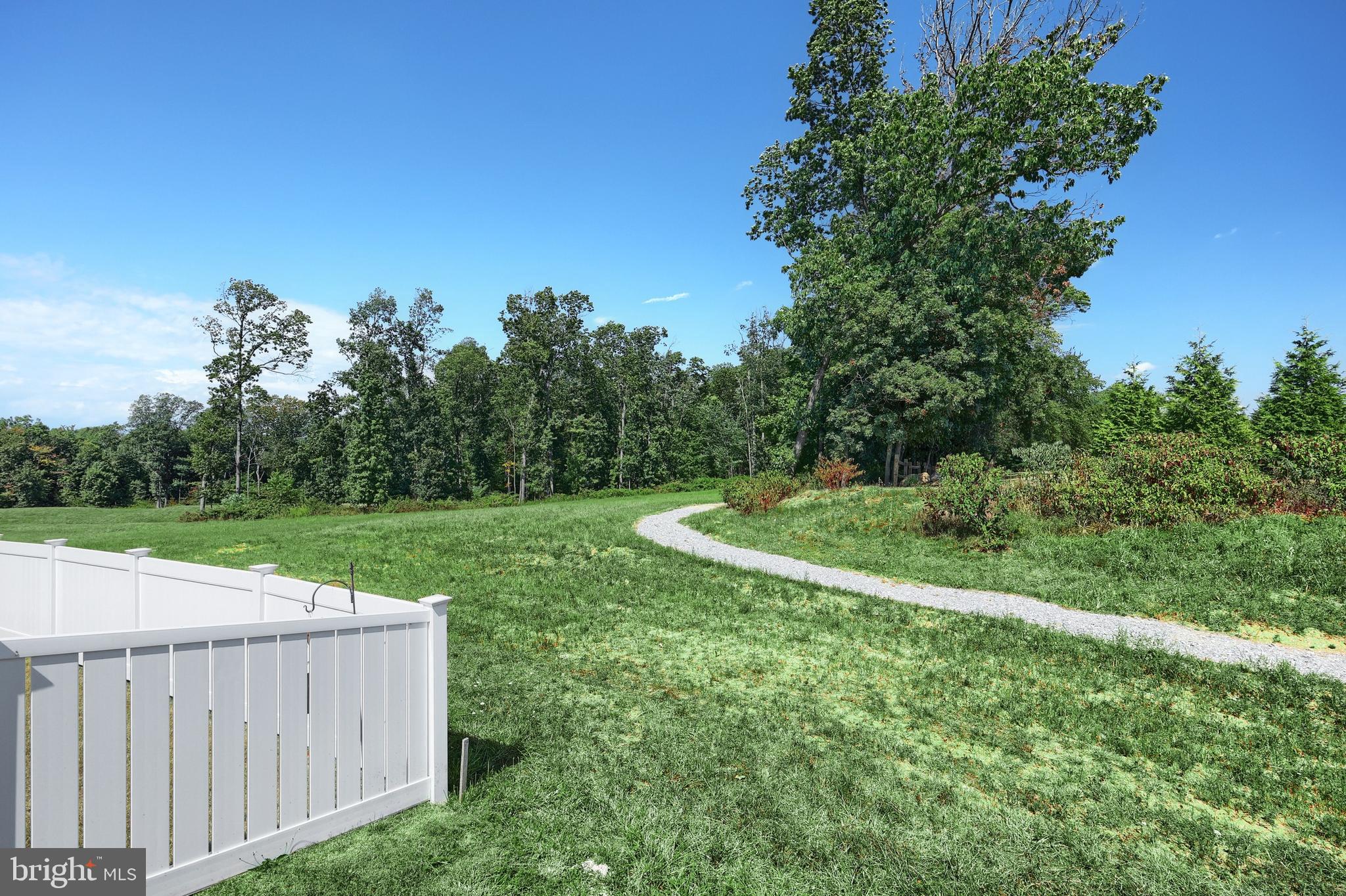 130 Pheasant Ridge Road Hanover, PA 17331 - Photo 41 of 59 a view of a backyard with a garden