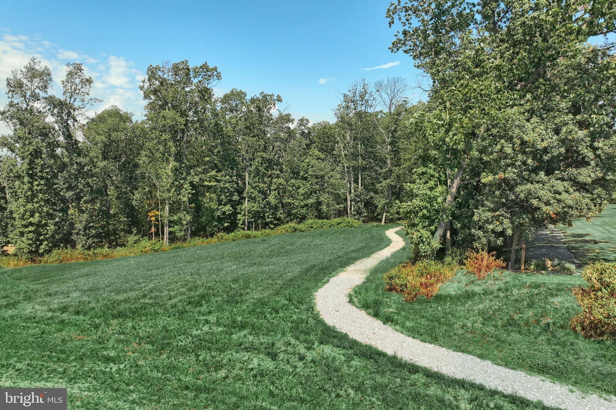 130 Pheasant Ridge Road Hanover, PA 17331 - Photo 46 of 59 a view of a golf course with a garden