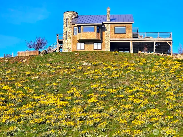 a bedroom with two beds and a couch